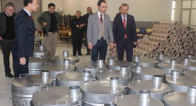 Depremzedeler için soba ve yakacak gönderildi