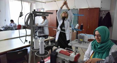 Kumaşlar belediyeden, tulumları üretmek bayanlardan