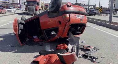 Takla atan otomobilden burnu bile kanamadan kurtuldu